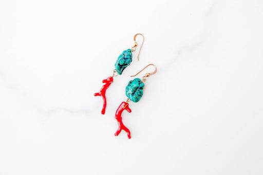 These earrings are a bright and colorful combination of the earth and the sea. Vibrant Arizona turquoise is accented by brilliant red coral and held together by 14k gold fill.