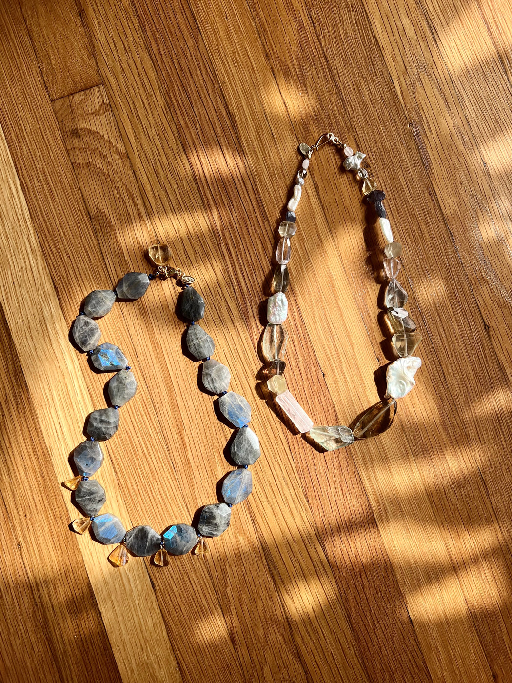 Earth Goddess energy radiates from this multi stone necklace ~ an array of stones to supercharge your aura.    Fluorite, topaz, citrine, smokey quartz, freshwater Pearl, iolite, rose quartz, lavender quartz strung on gold coated wire with gold fill findings.