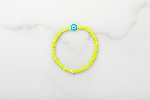 Neon yellow Japanese glass beads on sturdy elastic. For that little pop of color and protection for your personal space bubble. Wear just one or stack 'em.