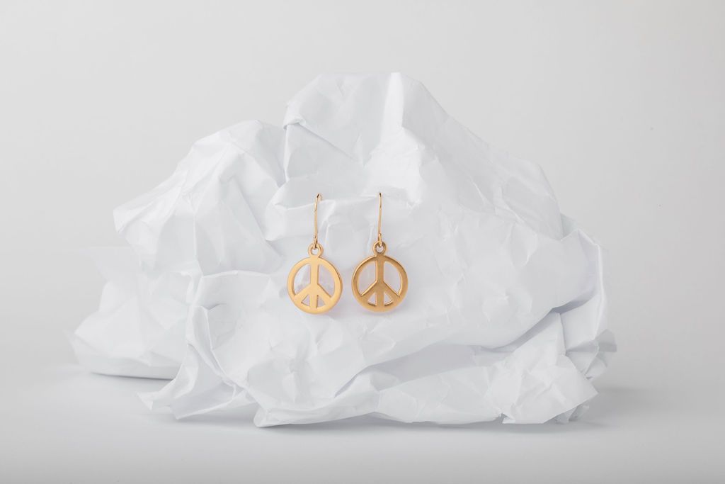 24K gold plated over sterling silver peace sign earrings. Thicker and larger than the smaller version we carry - for those who need an extra bit of peace in their lives!