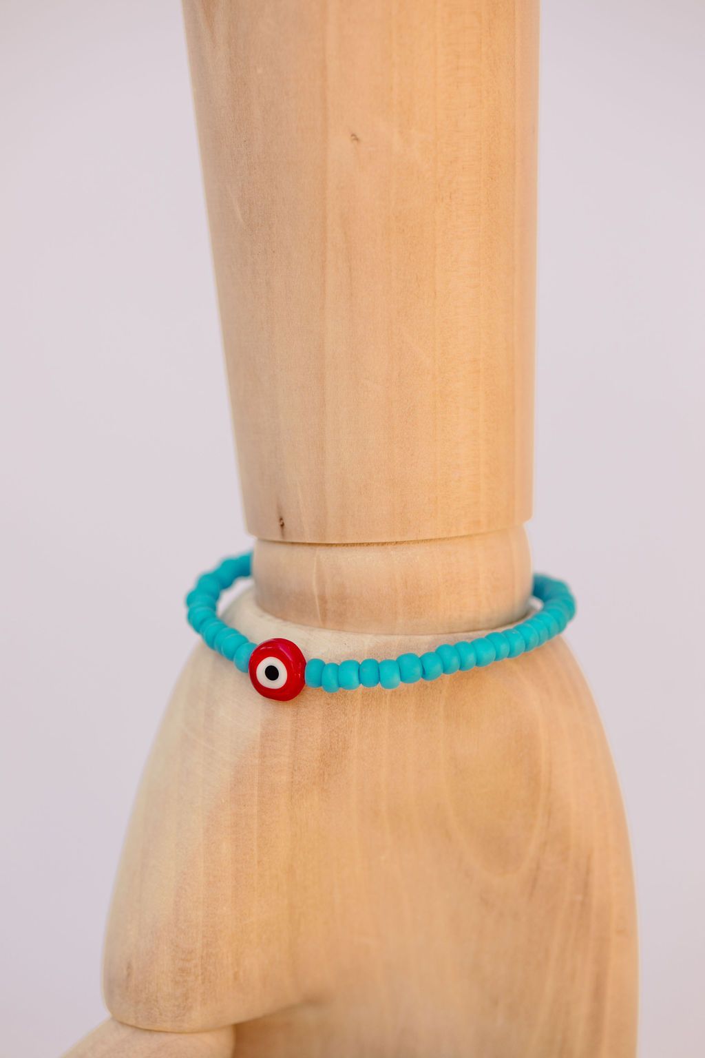 Turquoise Japanese glass beads on sturdy elastic. For that little pop of color and protection for your personal space bubble. Wear just one or stack 'em.