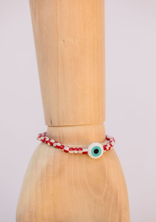 Red & white striped Japanese glass beads on sturdy elastic. For that little pop of color and protection for your personal space bubble. Wear just one or stack 'em.