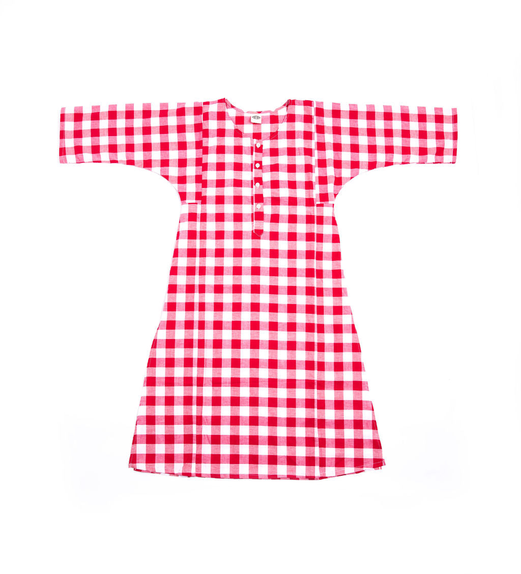 Beach Tunic in Gingham - Beach Tunic in Polka Dot - The Beach Tunic is the epitome of easy-breezy with a healthy dash of bold pattern. Extra structure under the arms and side slits up to the hip give you room to run for the surf and stretch for the sun.