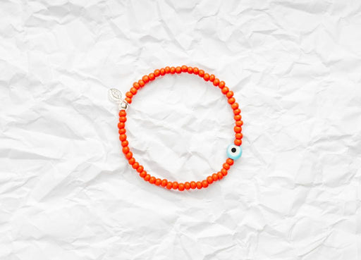 7" orange glass beaded bracelet. Available in small (7") or large (7.5") sizes. If you want a different size, please get in touch with me here!