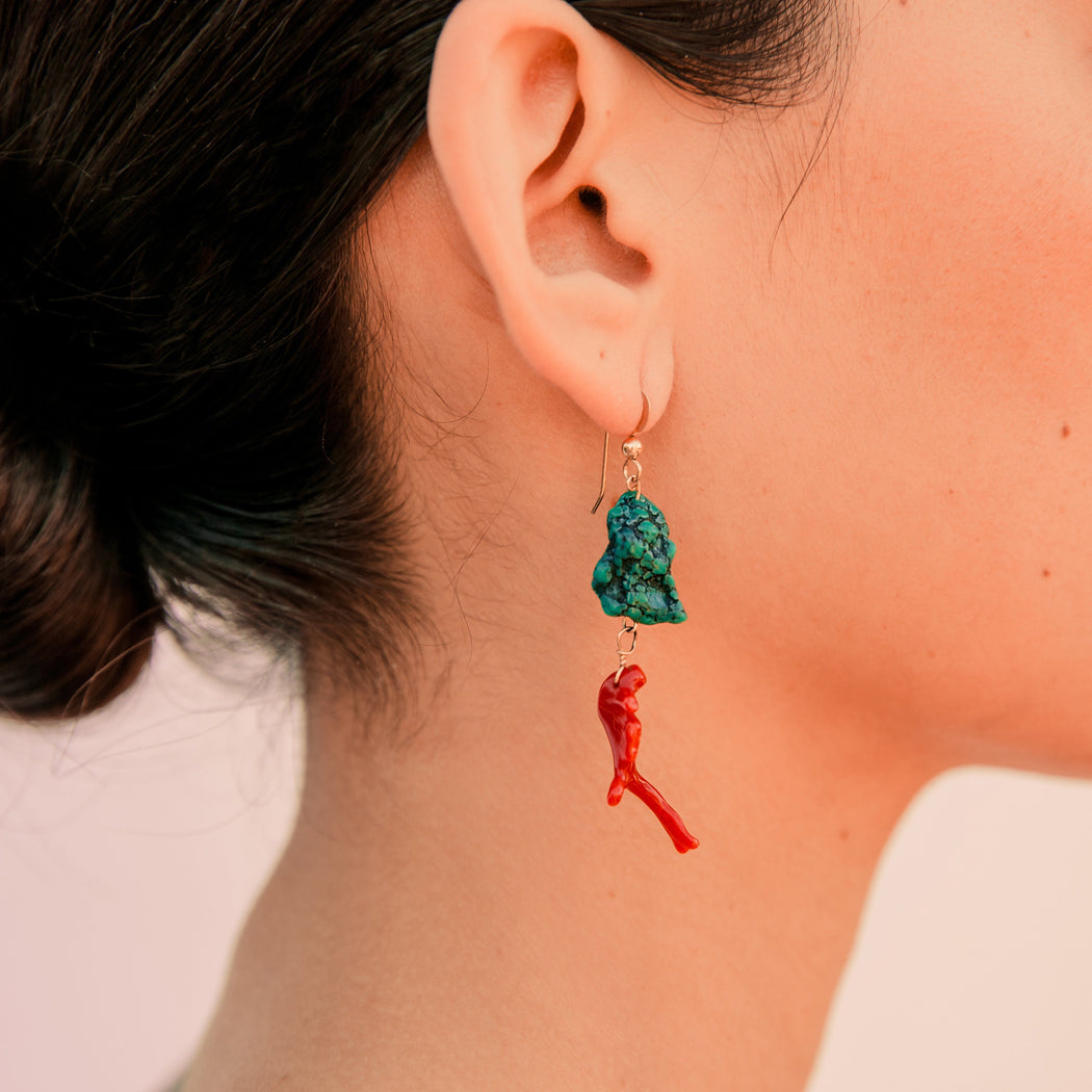 These earrings are a bright and colorful combination of the earth and the sea. Vibrant Arizona turquoise is accented by brilliant red coral and held together by 14k gold fill.