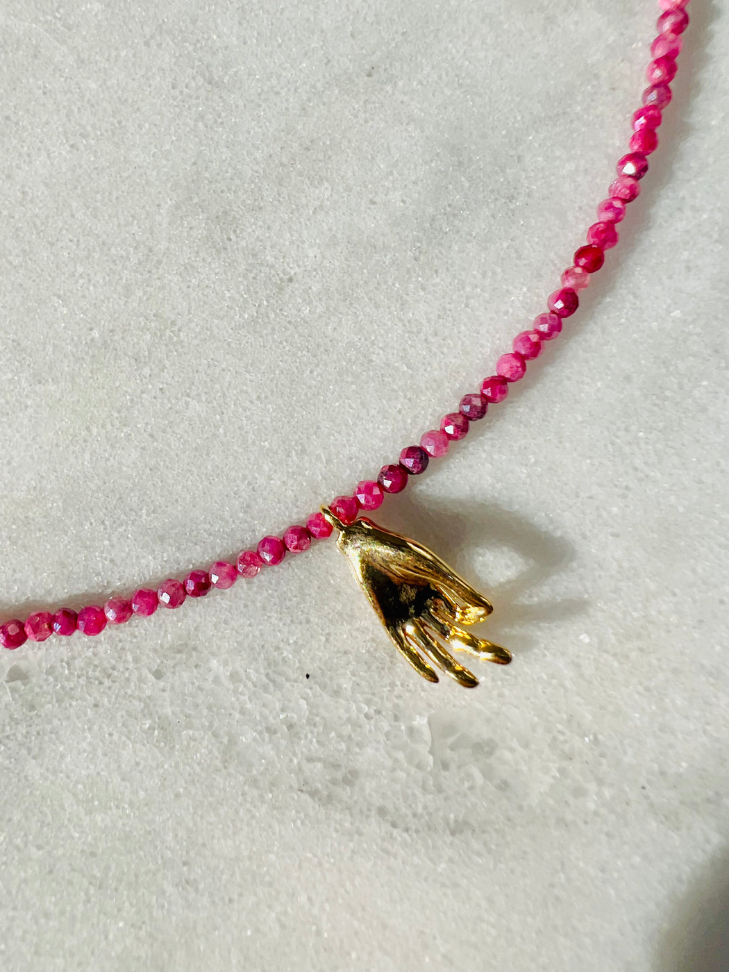  Ruby’s empowering, protective energy encourages you to move forward without fear while knocking down your goals, one after the other.Gyan mudra, aka the mudra of knowledge, stimulates the air and ether within you to activate your higher consciousness. The pink sapphire beads in this necklace reinforce this intention with loving devotion. designed by Carrie Marill