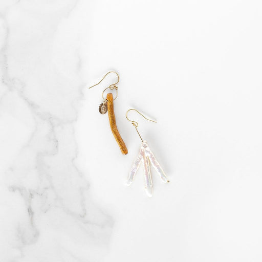 Neptune was the powerful God of the Sea in Roman mythology, and these beautiful handmade earrings capture some of his commanding presence with warm golden coral and freshwater pearl and sunny 14k gold fill.