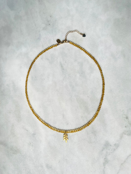 Citrine Necklace - strung on gold coated wire with gold fill clasp.  Accented with Leaf charm. PUNKWASP by Carrie marill