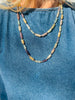Ground into Mama Earth's natural beauty with organic colors of Tourmaline, hand knotted on silk chord with gold accents for the Empress that you are.  Materials Matter: Varied color tourmaline tube beads, hand knotted on silk cord with gold fill findings and lobster clasp. Necklace Designed in California by Carrie Marill.