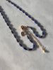 You know the way. Open pathways to your most ancient wisdom with delicate lapis lazuli, beaded along with gold accents. Transcend time through the portal of the Roman gold coin. hand knotted silk chord necklace designed by Carrie Marill 